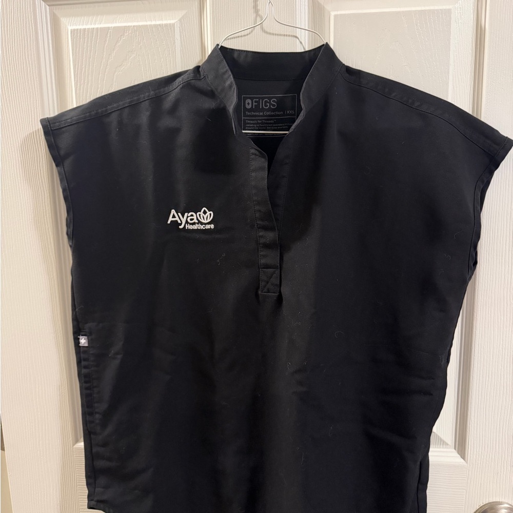 Figs Black Scrub Top with White Aya Healthcare Logo
